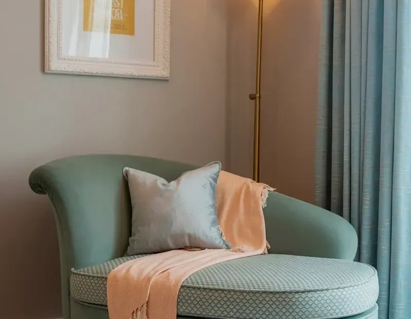 Curved Chaise Lounge Styling: Sage Green Velvet + Tasseled Peach Throw